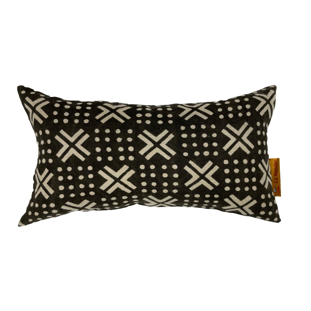 Coussin de couleur noire avec des motifs en croix et des points sur fond blanc- Black cushion with cross patterns and dots on a white background